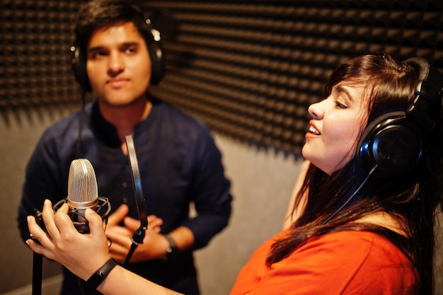 Microphone setup for recording during advanced singing instruction sessions